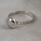 Sterling Silver Ring with Patterned Band with a SS Dome