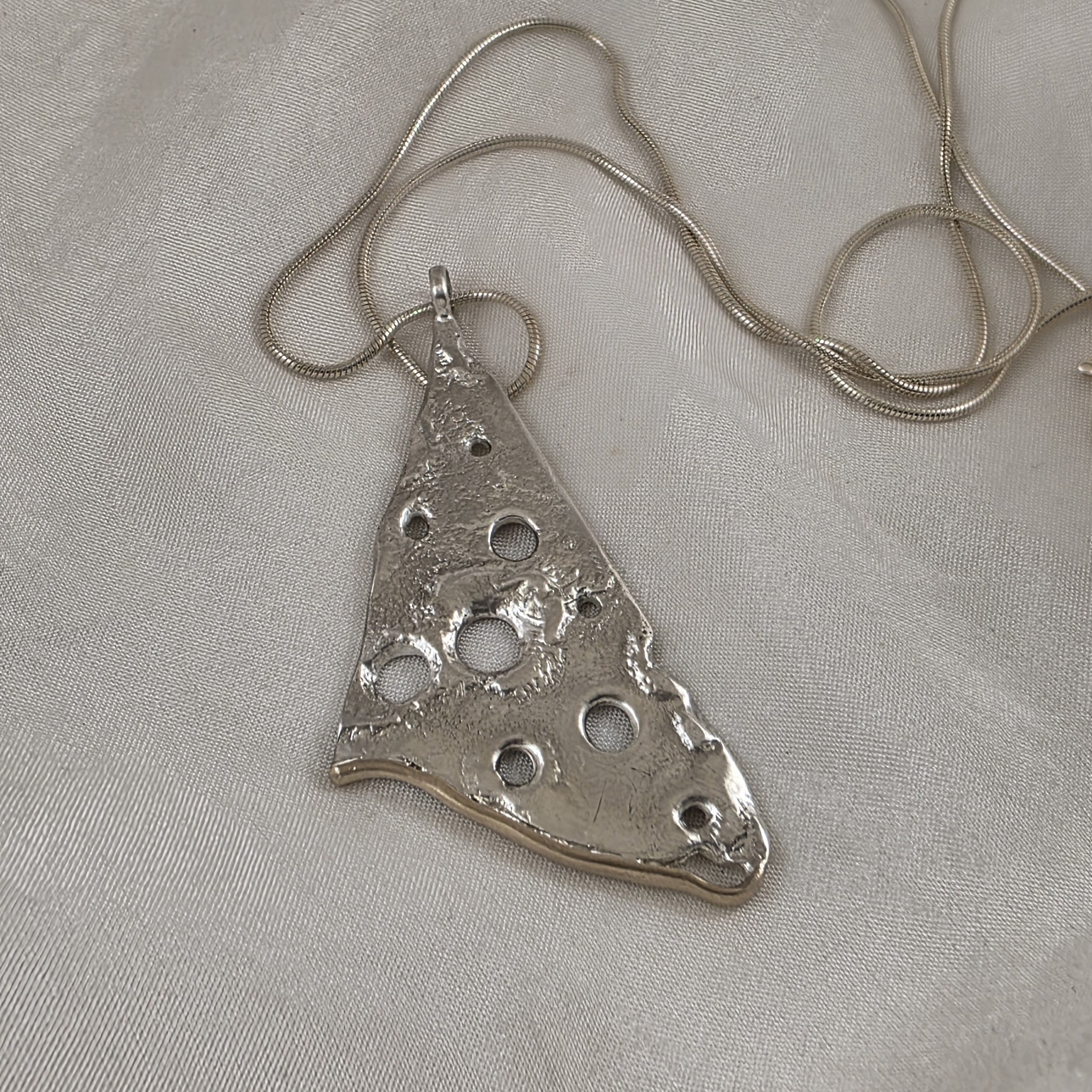 Sterling Silver Holey Pendant with 9ct Yellow Gold Border