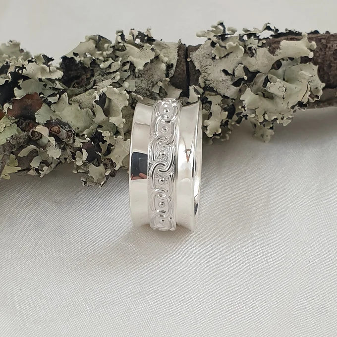 Sterling Silver Flared Ring with Embossed Circle