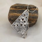 Sterling Silver Holey Pendant with 9ct Yellow Gold Border